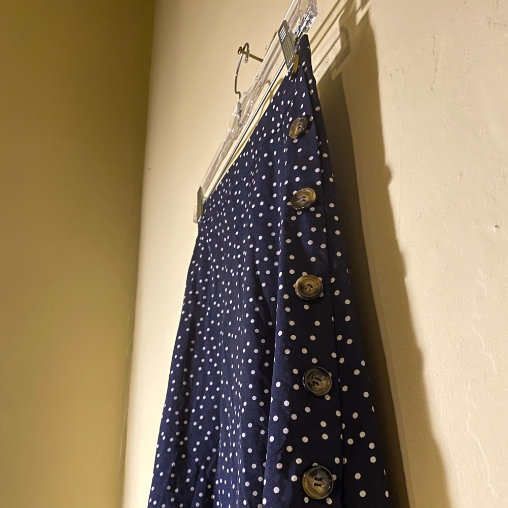 Size 0-2 midi wrap skirt with CUTE side buttons.